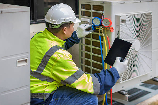 Professional Air Duct Cleaning technician working in Waterford, NY